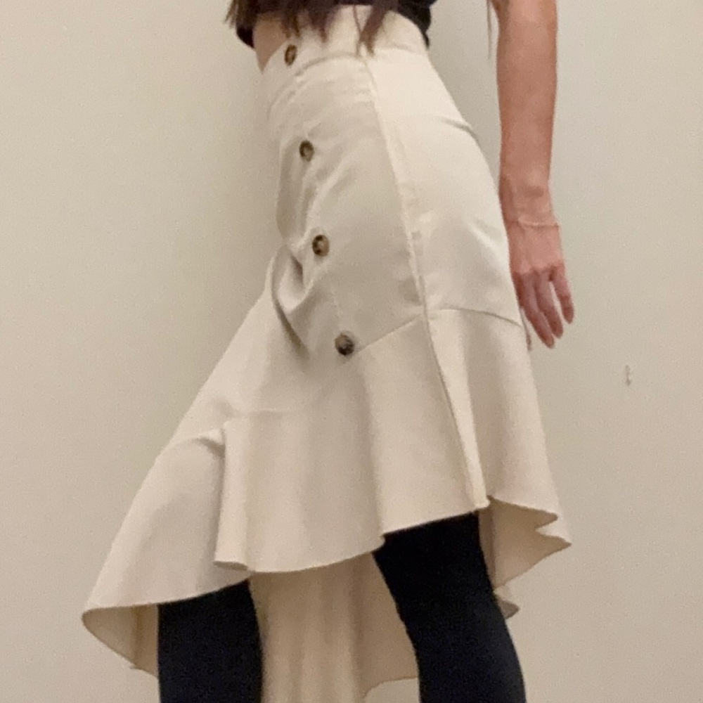 High-waisted button-front midi skirt with a ruffled hem